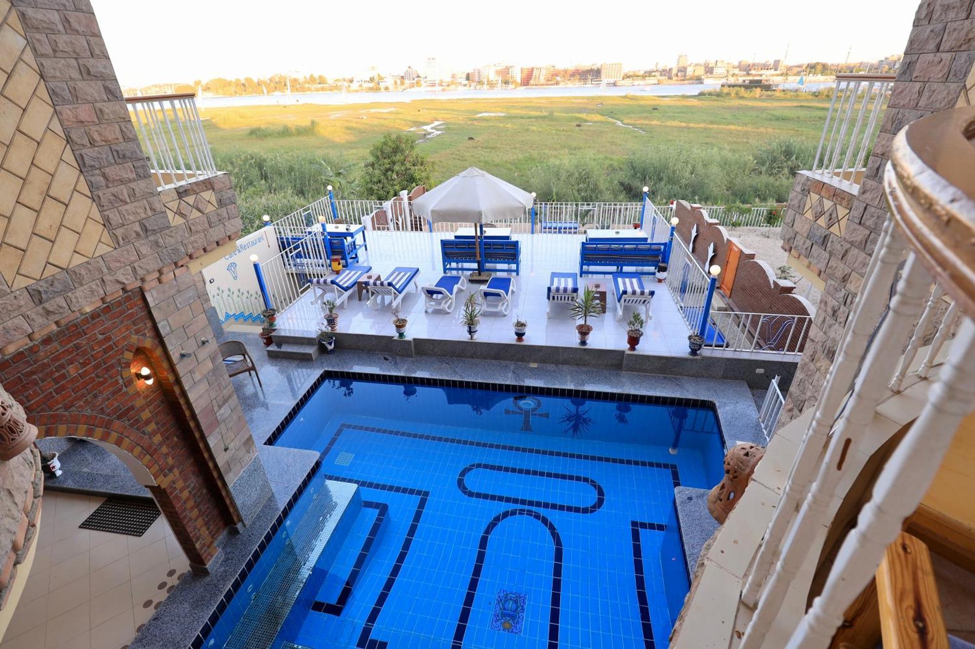 Appartement Blue Nile House à Louxor Chambre photo